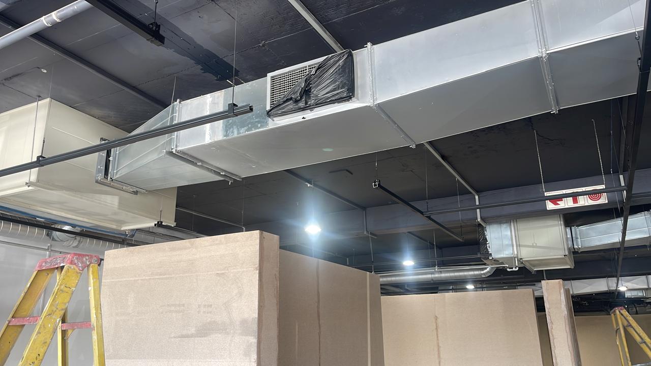 Rectangular ducting and equipment above new partitioning
