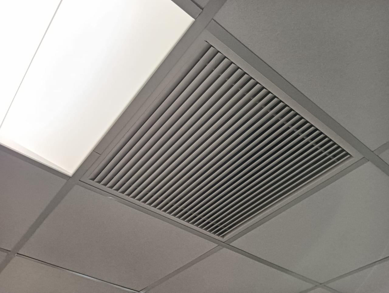 Supply air diffuser installed in an office ceiling